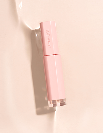 Riman ICD Beauty Glow Up Lip Oil in pink packaging, perfect for all-day moisturizing lip care and nighttime hydration.