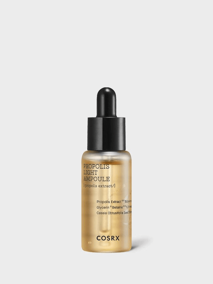 COSRX Full Fit Propolis Light Ampoule | Korean Face Ampoule in a glass bottle with dropper for glowing skin.