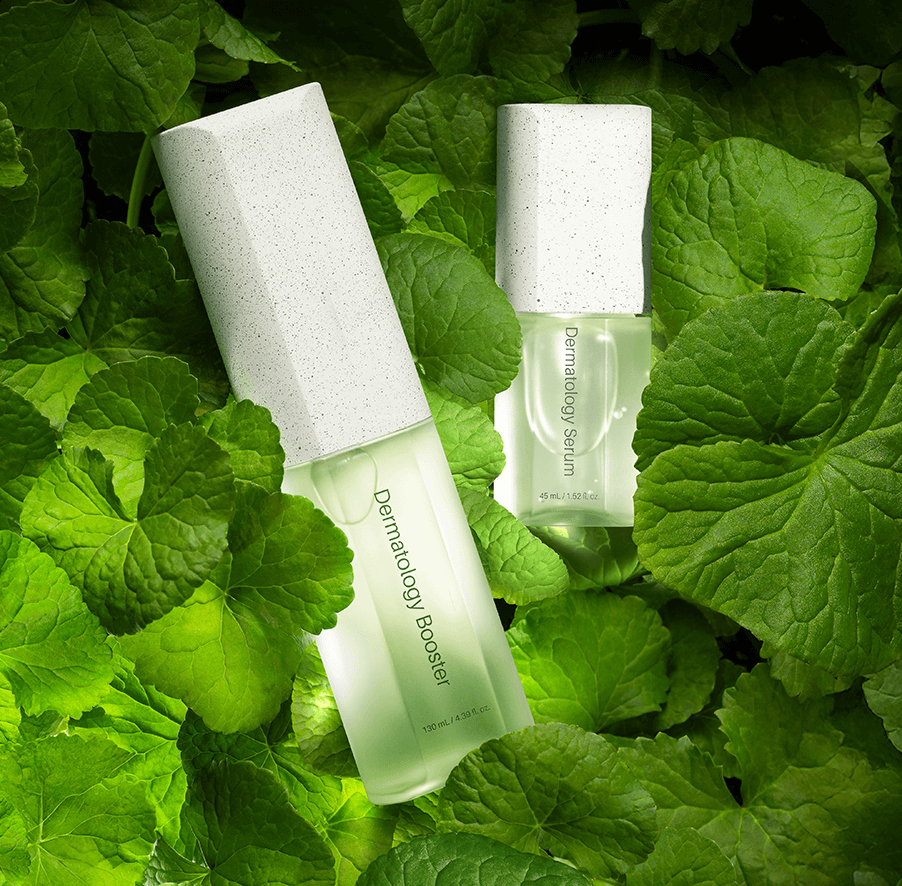 Riman ICD Dermatology booster and serum set on green leaves, promoting deep hydration and youthful skin.