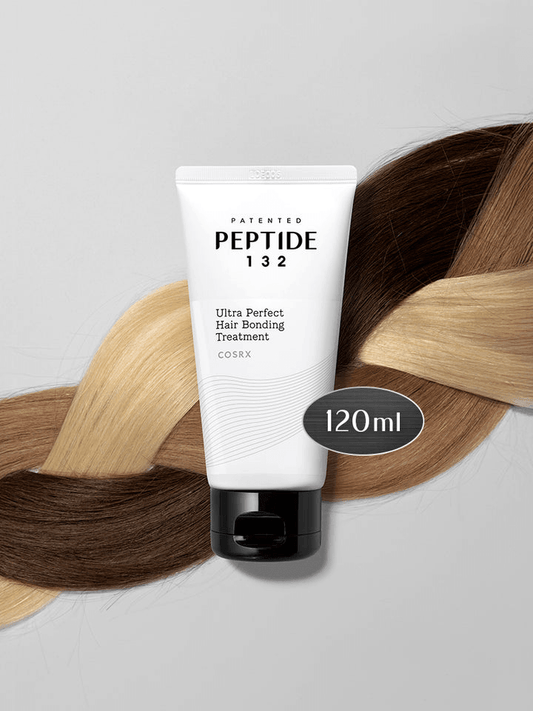 Tube of Peptide 132 hair bonding treatment with braided hair in the background