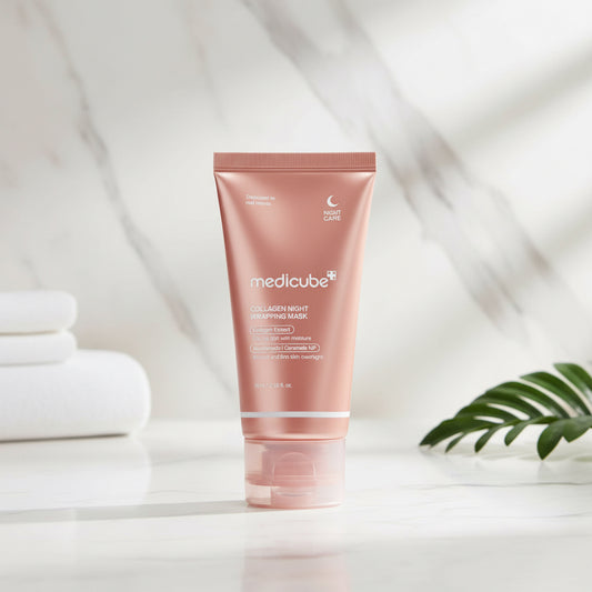 Pink tube of Medicube Collagen Night Wrapping Mask on a white background