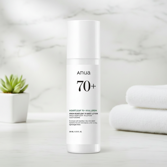 White skincare bottle labeled 'Anua 70+' on a white background