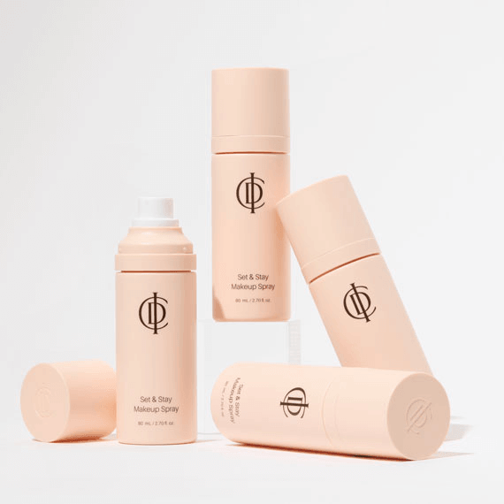 Riman ICD Makeup Set & Stay Makeup Spray bottles arranged for an elegant display, showcasing skincare and makeup setting functionality.