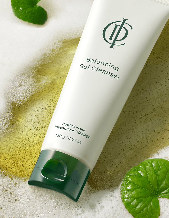 RIMAN ICD Balancing Gel Cleanser in a foamy setting with natural mint leaves. Gentle Korean skincare product.