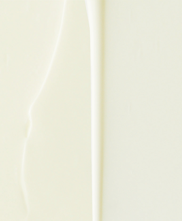 Close-up of a smooth, creamy texture, ideal for skincare or cosmetic products.