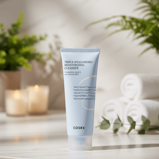COSRX Triple Hyaluronic Moisturizing Cleanser in a light blue tube on a neutral background.