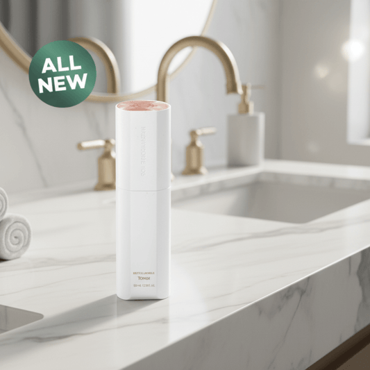ICD Radiansome 100 Microfluidizer Toner displayed in a bathroom setting with a marble countertop.