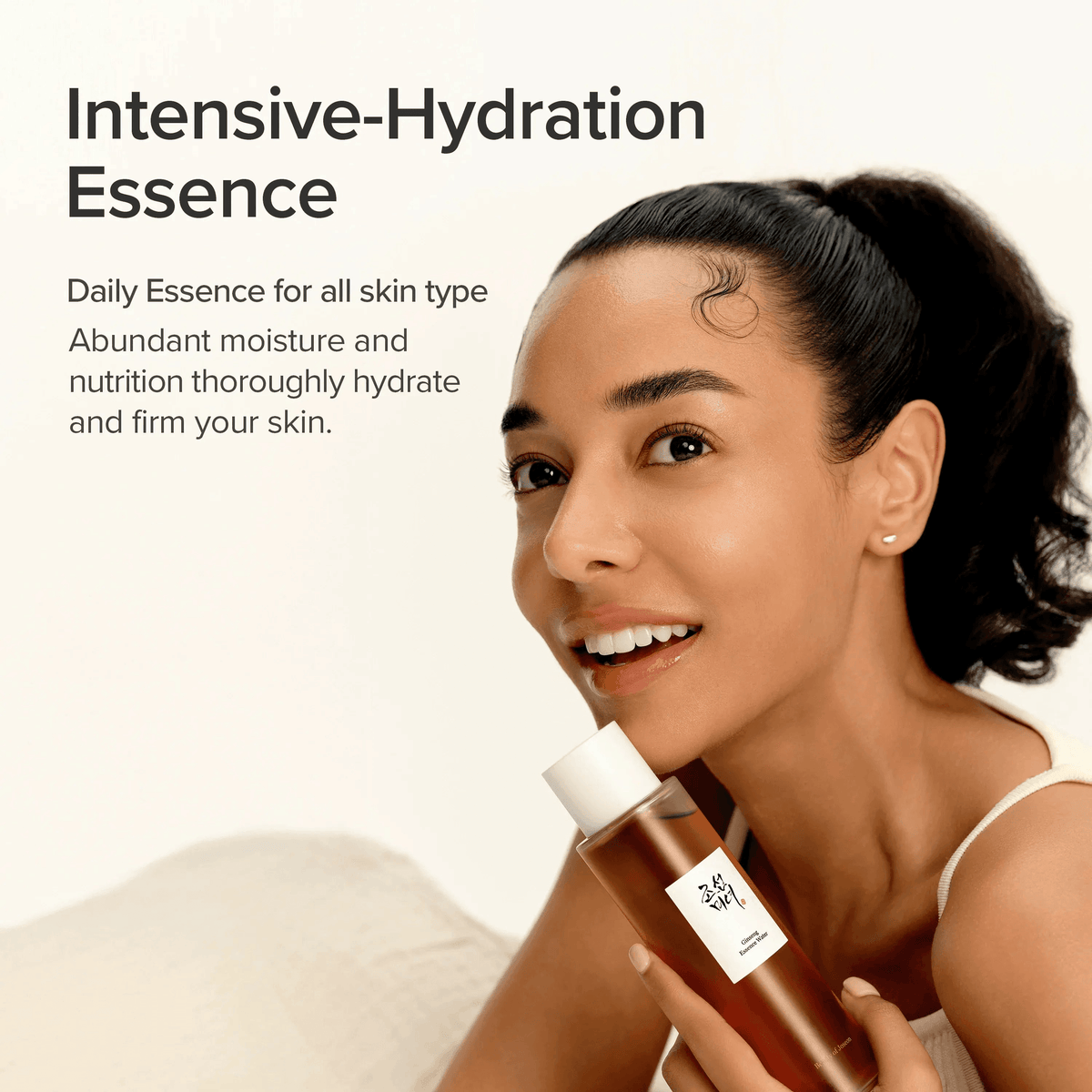 Beauty of Joseon Ginseng Essence Water in a woman's hand, part of Korean skincare routine for hydrated skin.