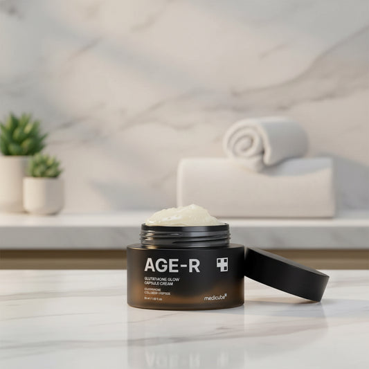 Medicube AGE-R Glutathione Glow Capsule Cream in a jar with a smooth cream texture, showcasing Korean skin care products.
