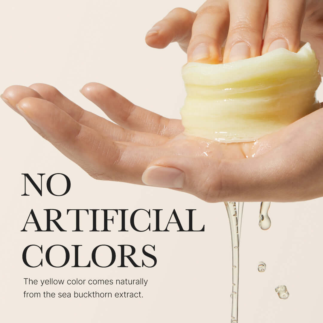 Medicube Deep Vita C Pads in hand, demonstrating natural yellow color from sea buckthorn extract, with no artificial colors.
