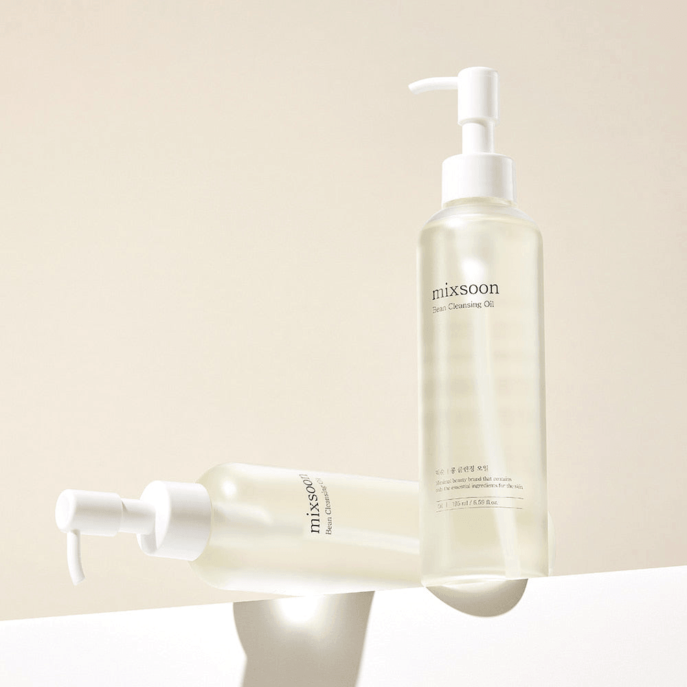mixsoon Bean Cleansing Oil bottles on a sleek surface, showcasing a lightweight formula for healthy skin.