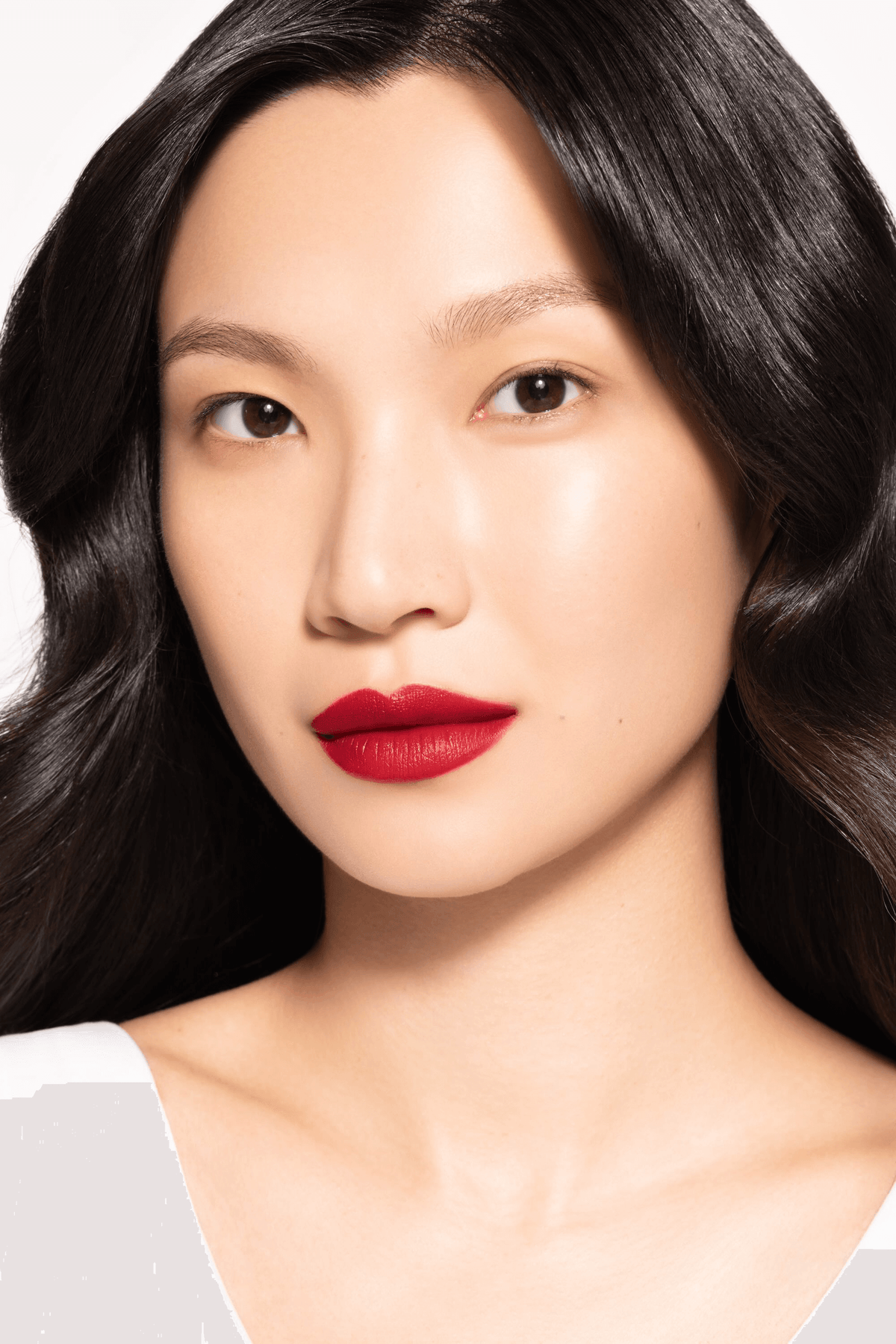 Riman ICD Makeup Butter Lip Tint Velvet Matte showcased on model with bold red matte lips.