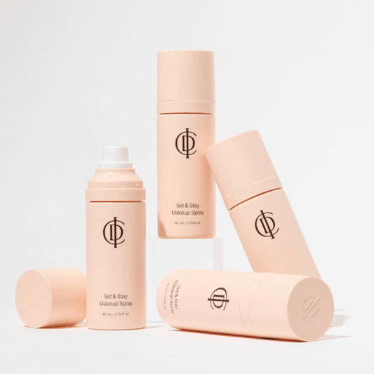 Riman ICD Makeup Set & Stay Makeup Spray bottles arranged for an elegant display, showcasing skincare and makeup setting functionality.