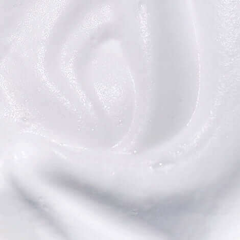Close-up of Riman Incellderm Snow Enzyme Cleanser EX, a light, creamy texture that foams for gentle cleansing.