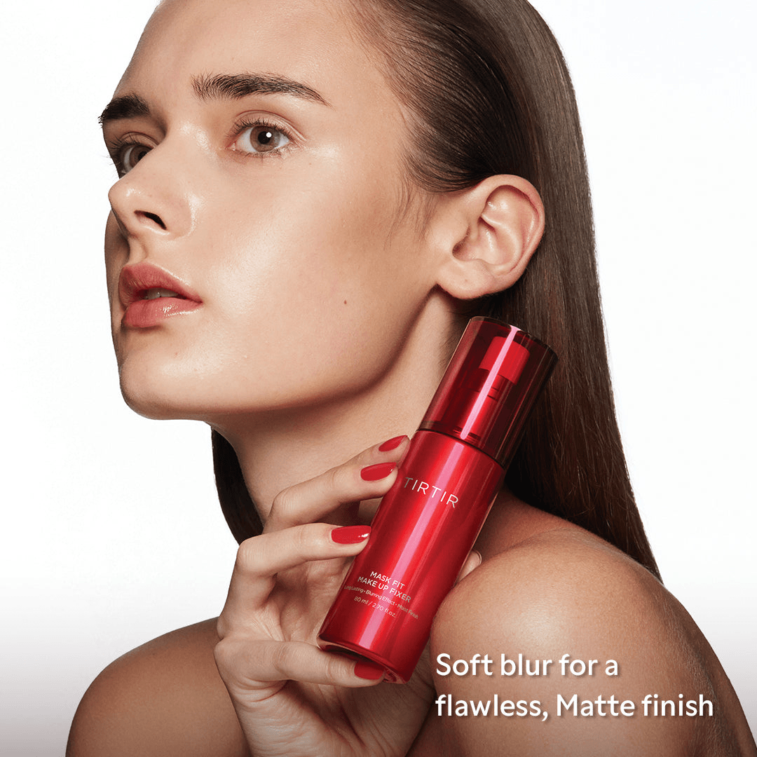 TIRTIR Mask Fit Makeup Fixer bottle held by a model demonstrating Korean face products for a flawless finish.